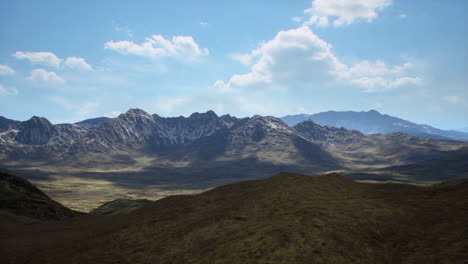 majestic mountain range under a clear blue sky in daytime landscape