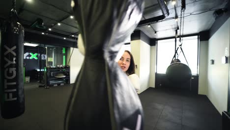 woman boxing training session in modern gym