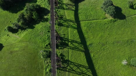 An-aerial-view-of-the-Moodna-Viaduct,-steel-railroad-trestle-in-Cornwall,-NY-on-a-sunny-day