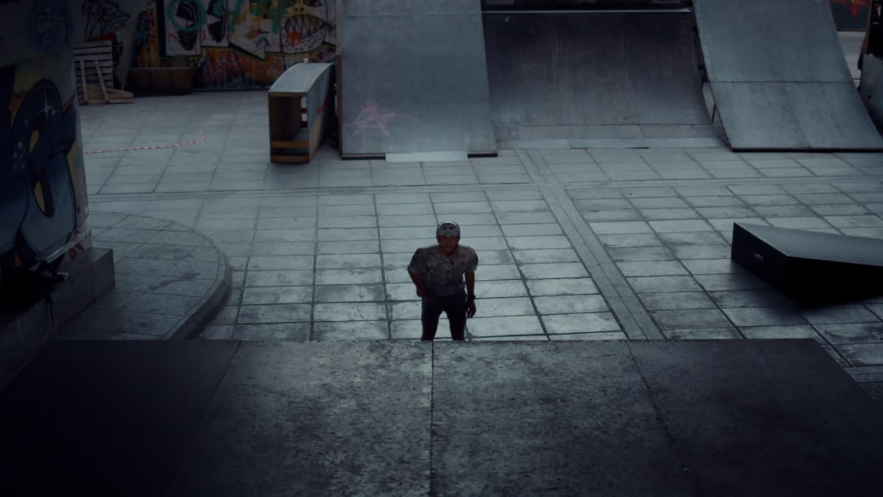 Extreme roller skater riding on ramp outdoors. Sporty man in roller skates.