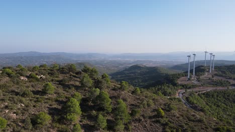 Drone-shot-of-a-wind-farm-for-eolic-energy-production-in-Catalonia,-Spain