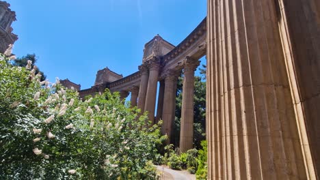 palace of fine arts columns and trees on sunny day, san francisco, california usa