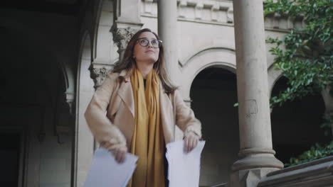 student throwing documents in college