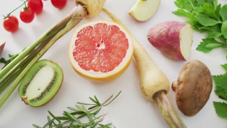 video of fresh fruit and vegetables on white background