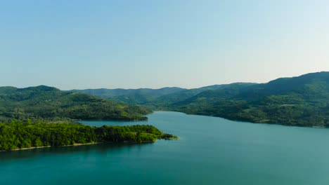 4k drone wide shot over beautiful lake in the european outdoors