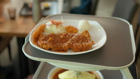 Delivery-Robot-Servant-Delivering-Food-in-Korean-Restaurant-on-Tray-Platform---Tracking-motion