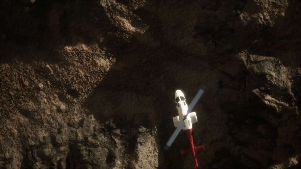 helicóptero en cámara lenta sobre el desierto rocoso