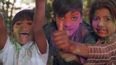 kids celebrating the hindu festival of holi in rajasthan, india