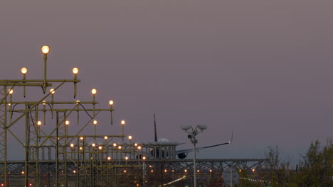 airplane landing at dusk