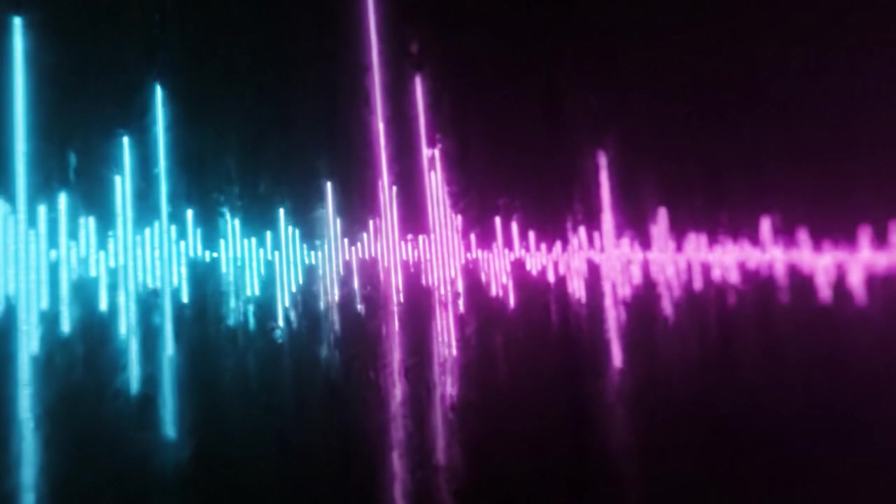 A Visual Representation of Audio Waves Transitioning from Blue to Pink in a Dark Environment, Showcasing the Dynamic Nature of Sound Frequencies and Colors