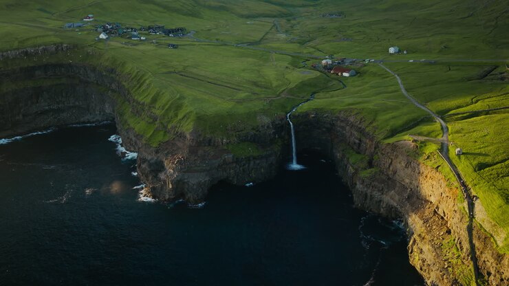 Múlafossur Waterfall and Gásadalur Village in Faroe Islands