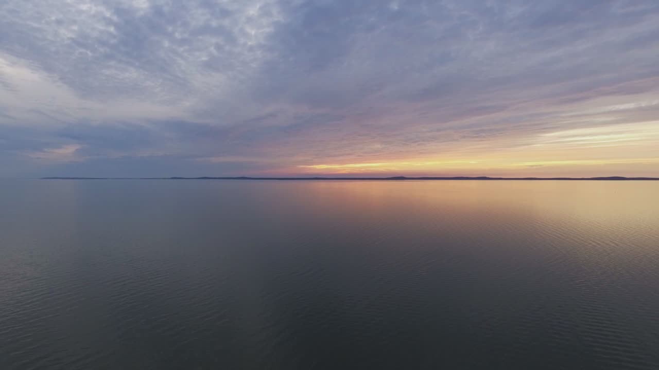 Lagoon and the Curonian Spit During Sunset. Aerial Panning Left Footage