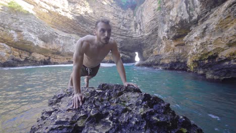 Doing-push-ups-on-sea-cliffs.