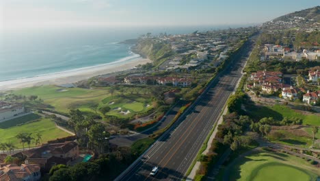 aerial view over the pacific coast highway with a view of the pacific ocean and monarch beach golf course