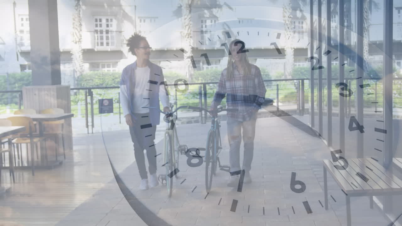 Animation of clock rotating over african american friends with bicycles walking on footpath in city