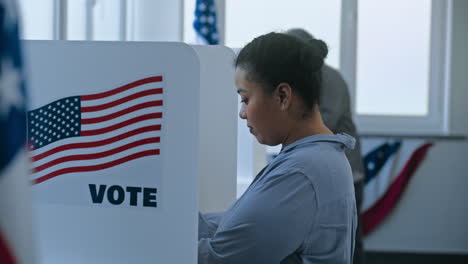 people voting at a polling place