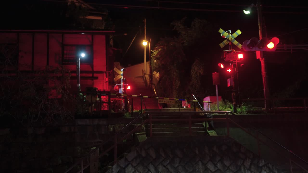 Night scene at a Japanese railway crossing