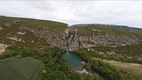 gorgeous aerial view flying toward a scenic gorge in the spanish countryside