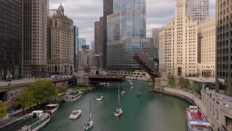 chicago river bridge lift with sailboats aerial view