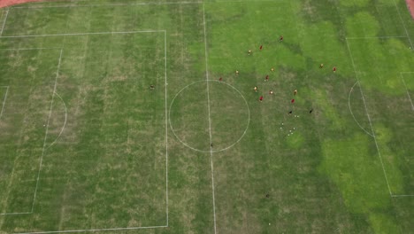 aerial view of people playing "tiki-taka tactics" in football