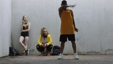 dancing man young happy street dancer performing freestyle moves friends watching enjoying dance in grungy urban warehouse