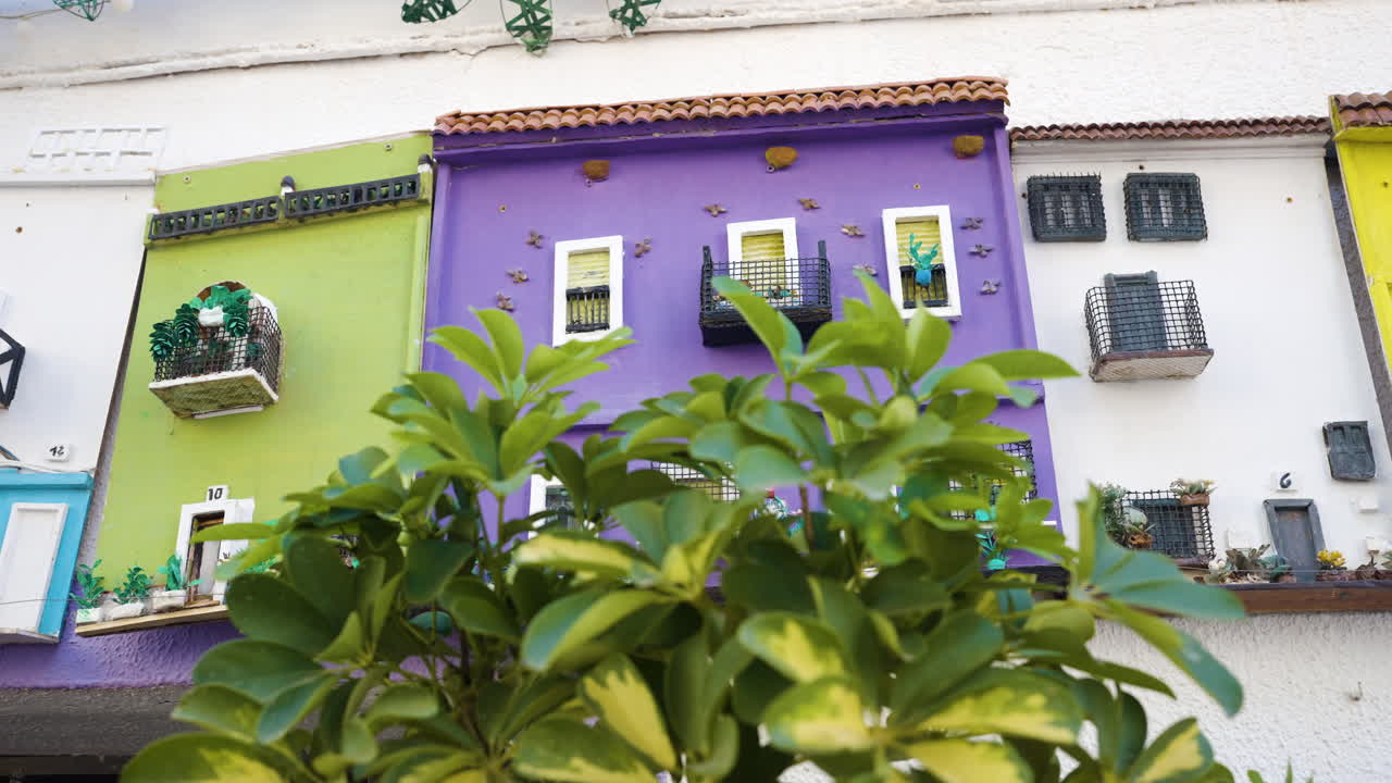 Colorful Miniature Houses on a Wall