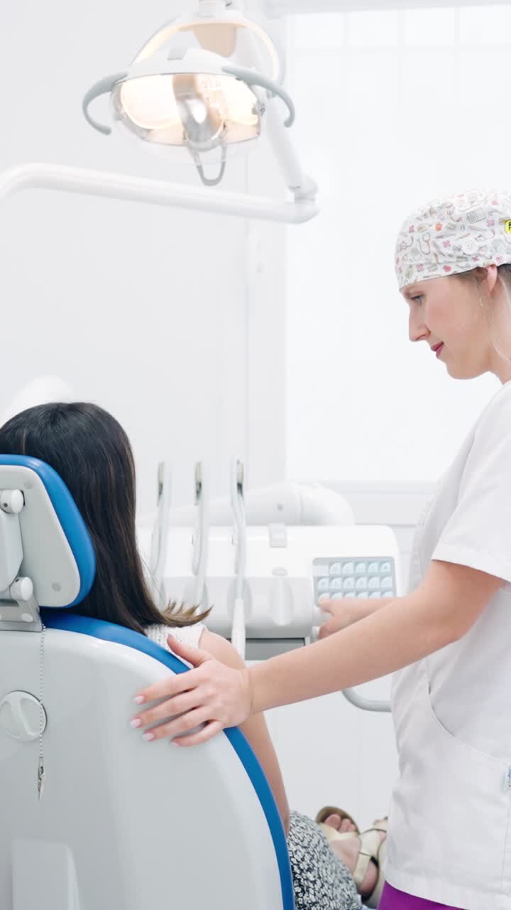 Dentist and patient in dental clinic