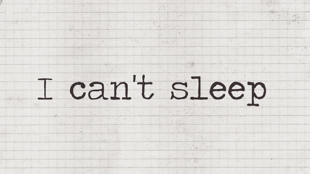 Typewriter characters appearing on an old paper sheet, composing the phrase: I can't sleep