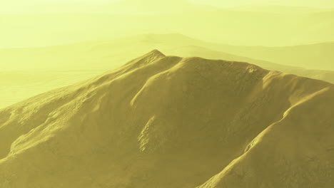 serene golden landscape with rolling hills under warm sunlight rays