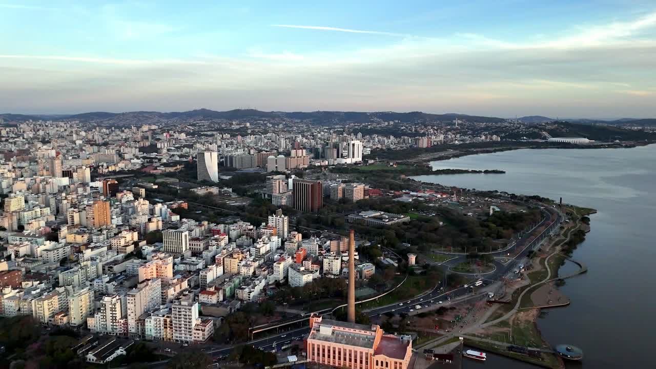Site of reflection, where past meets new, industrial memory, in city’s view