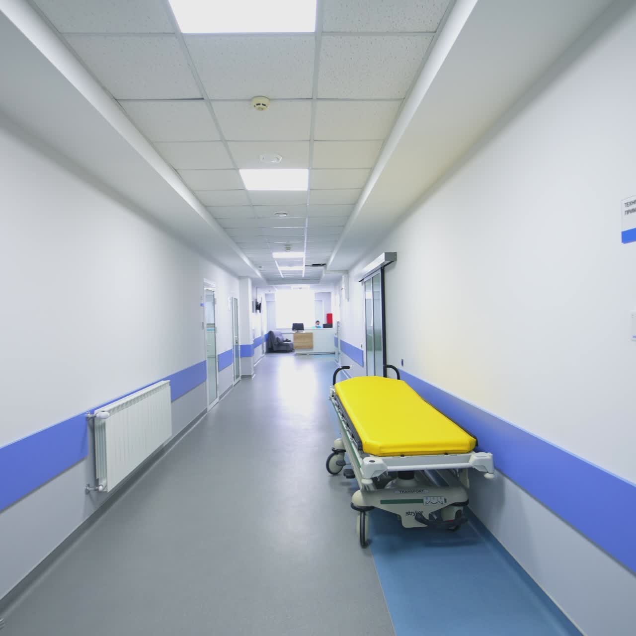 Long corridor in hospital. Empty long corridor in modern hospital