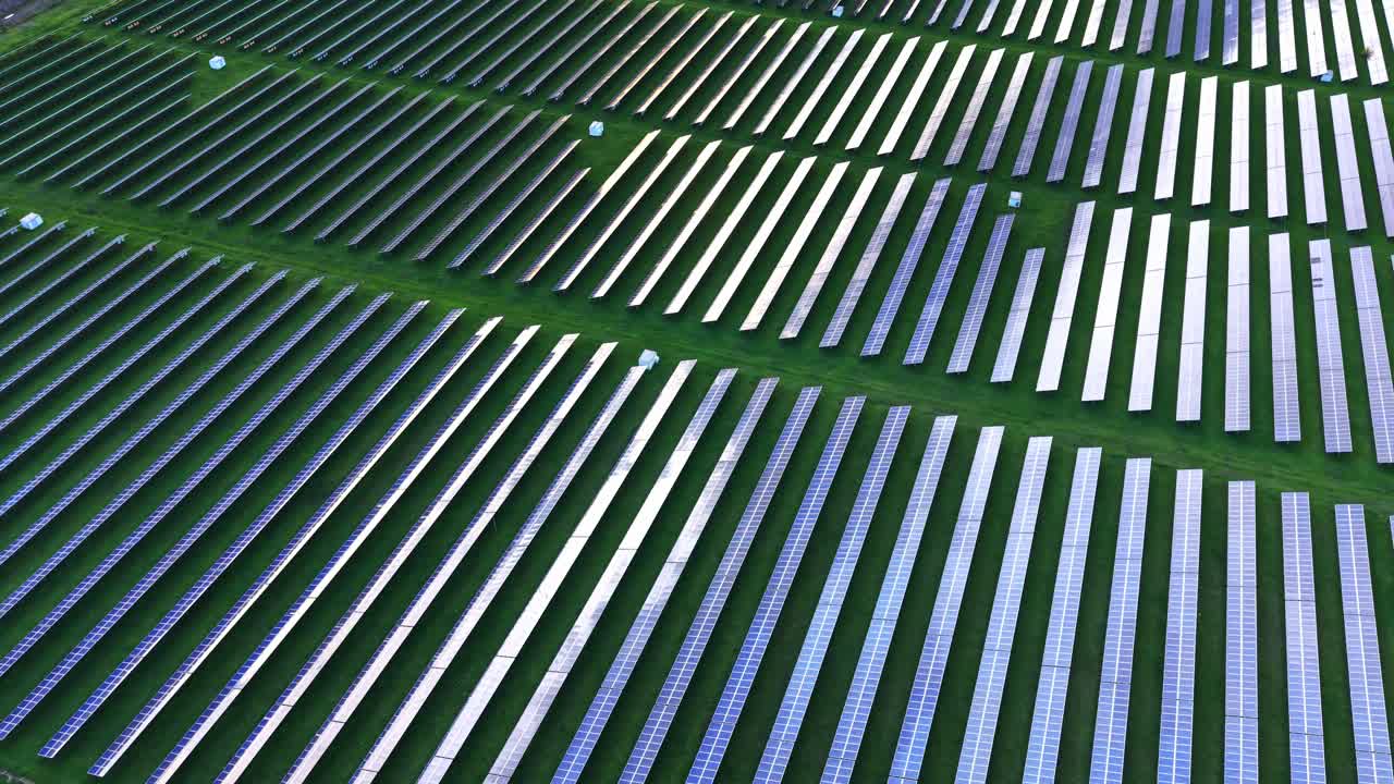 Solar panels cover a vast field in a sustainable energy project