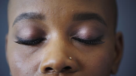 Closeup,-eyes-and-black-woman-with-makeup