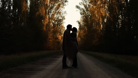 romantic couple embracing in nature