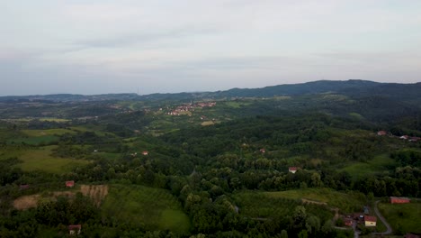 drone footage of lush green hills in a remote bosnian countryside