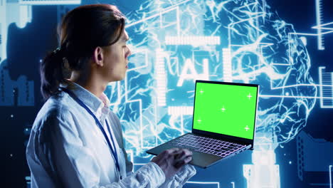 Admin-uses-green-screen-laptop-for-AI
