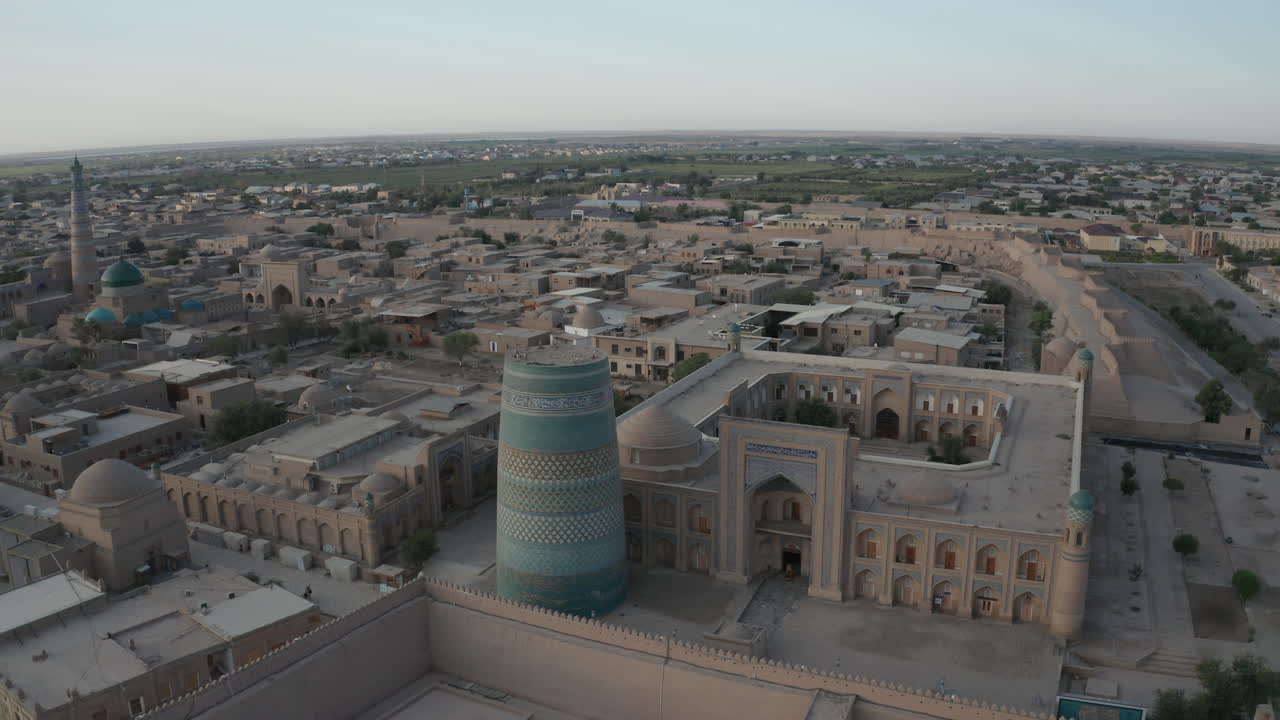 Aerial drone point of the Itchan Kala and Alla Kouli Khan Madrasa at the old walled city of Khiva in Uzbekistan