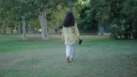 woman walking in park