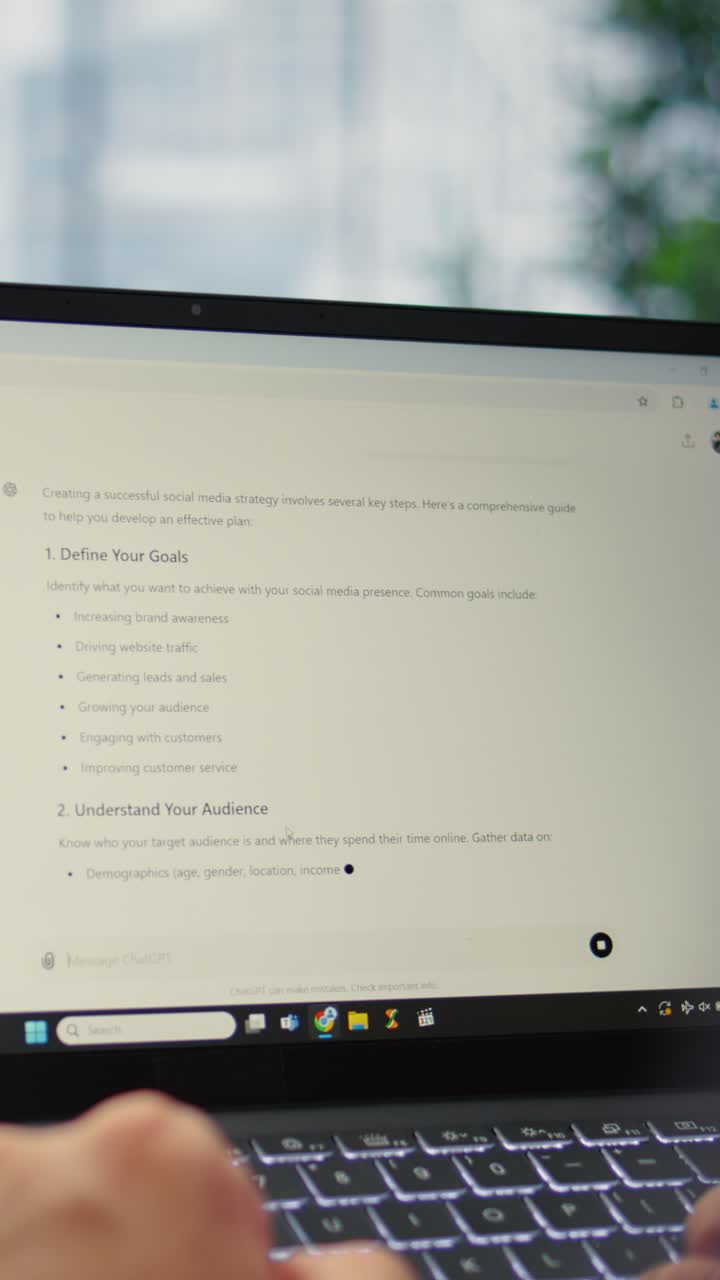 Vertical Video Bucharest, Romania - July 30th 2024 - Man uses futuristic AI chat on software