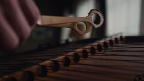 hammered dulcimer stringed musical instrument cinematic slow motion close up