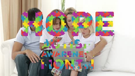 Jigsaw forming hope and autism awareness month text against family using laptop