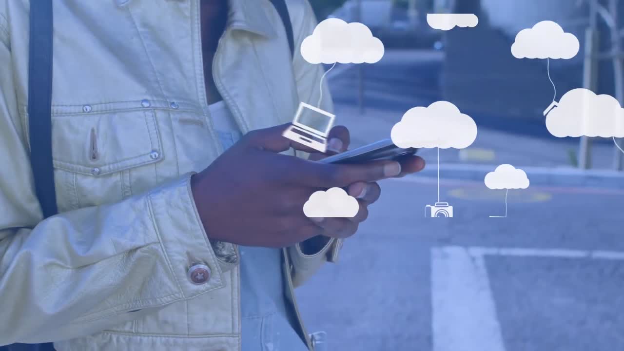 A woman is using a mobile phone in the city