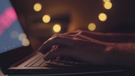 Close-up-hands-developing-software-app-using-digital-laptop-computer-typing-and-coding-code-on-laptop-computer-screen