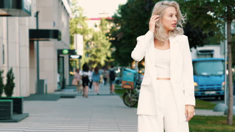 stylish woman in white suit