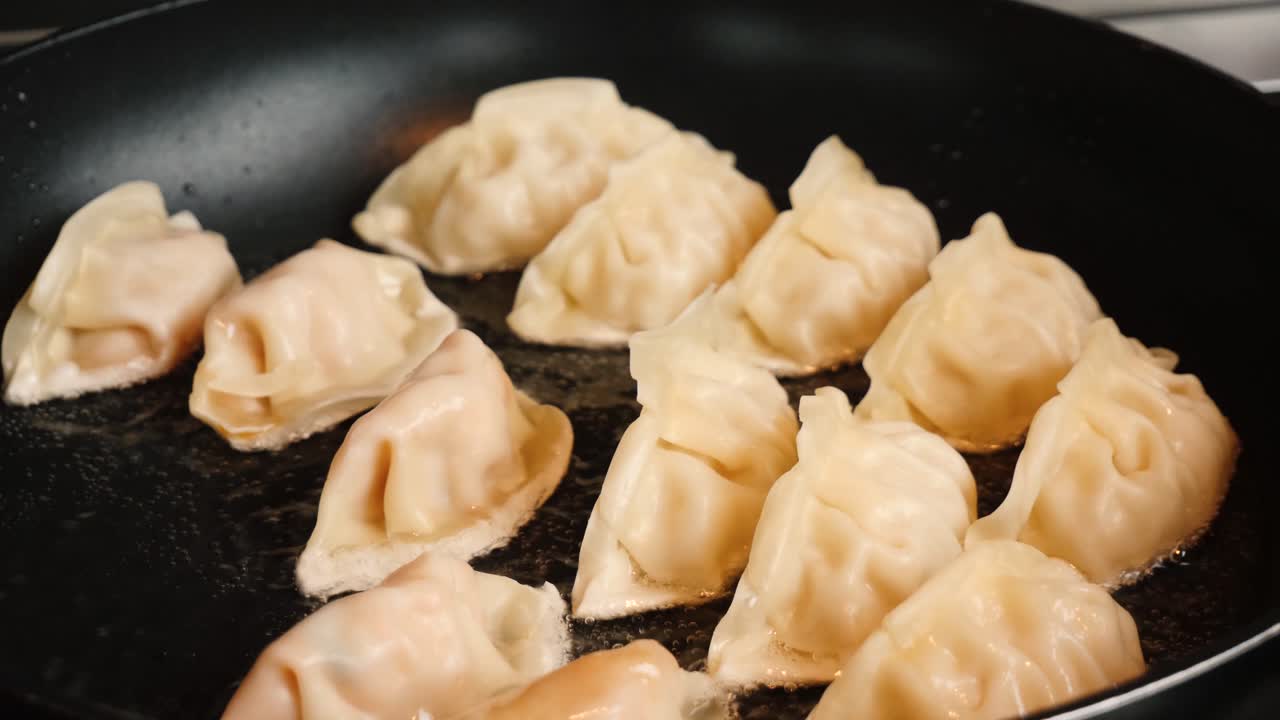 Cooking dumplings in a pan