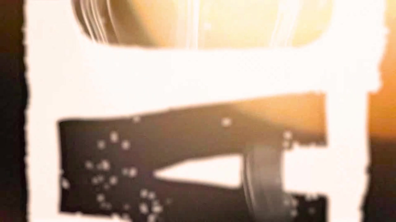 Abstract Light Leak and Film Grain Transition Effect