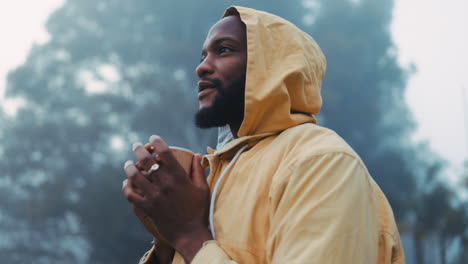 coffee, morning and black man hiking in the forest