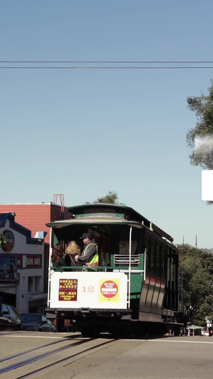 Animation of social media icons on multiple speech bubbles over tram operating on the street