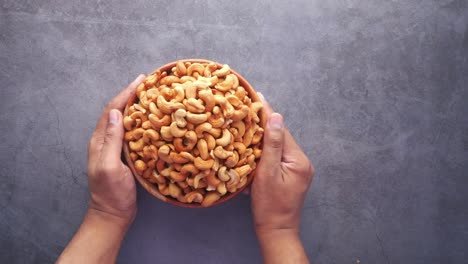 cashews in a wooden bowl