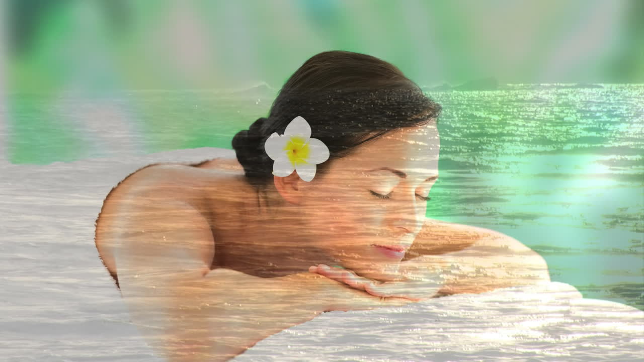 아름다운 여성들이 스파에서 휴식을 취하고 평화로운 바다 풍경